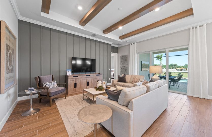 Spacious gathering room with sliding glass doors with lanai access