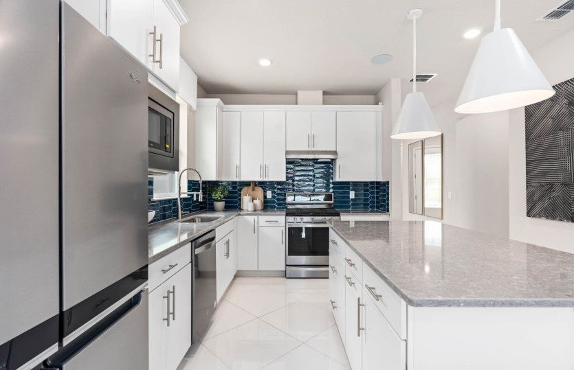 Spacious Kitchen with Modern Appliances - Model Pictured