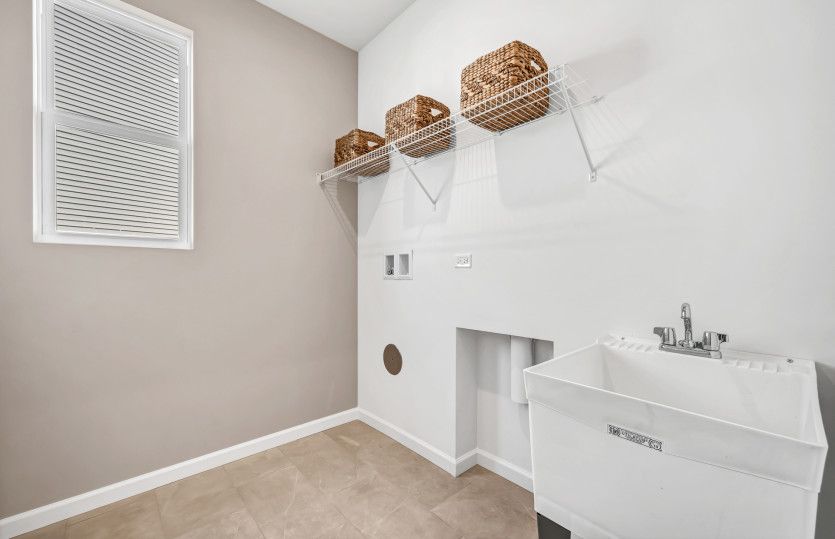 Laundry Room with Utility Sink and Shelving