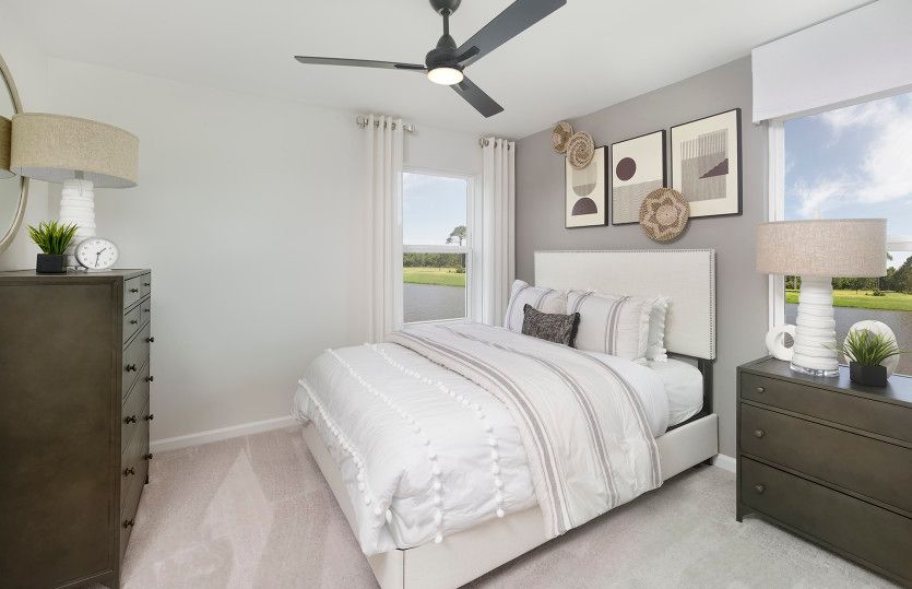 Comfortable additional bedrooms ideal for relaxing. Model Representation.