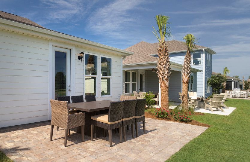 Gaze at the stars on the oversized back patio. Model Representation.