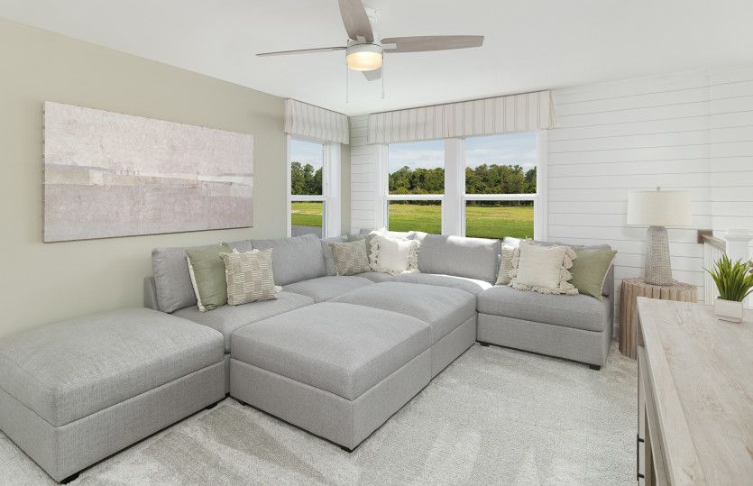 Multifunctional Upstairs Loft that can serve as a space to entertain guest. Model Representation.