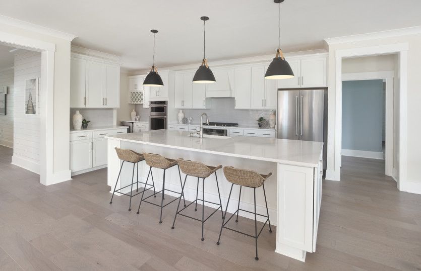 Open Kitchen with an oversized island perfect for additional seating opportunities and storage