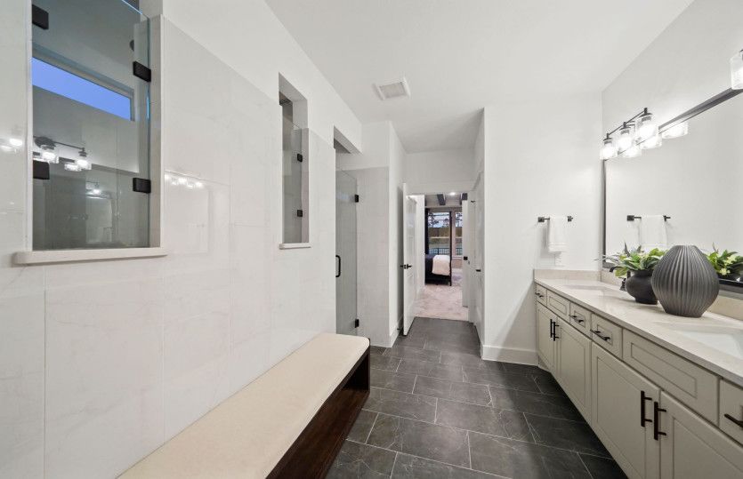Owner's Bath with Spa Shower and Dual Vanities