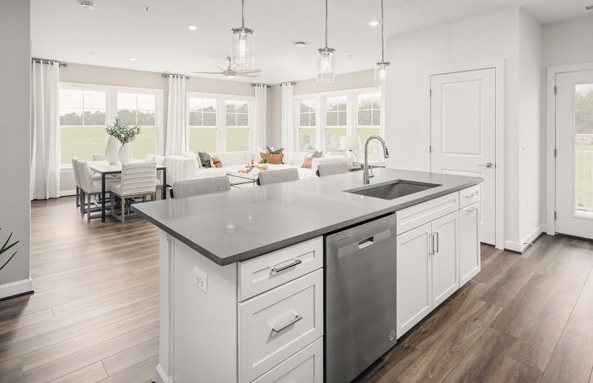 Kitchen Overlooks Dining Room and Gathering Room