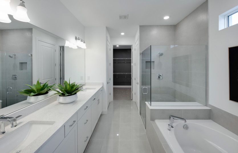 Owner's bathroom with dual sink vanity