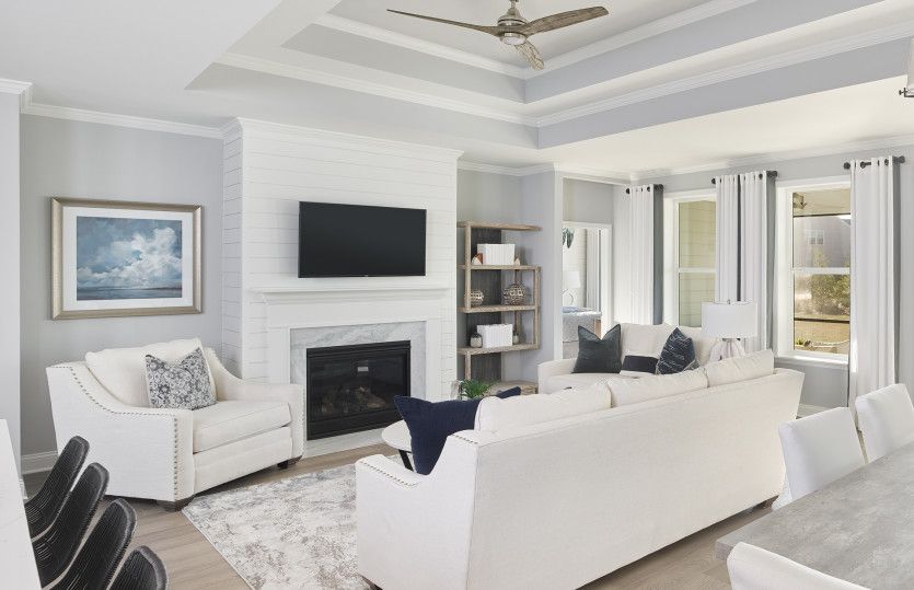 Get cozy near at the optional  fireplace in the Gathering Room with a tray ceiling.