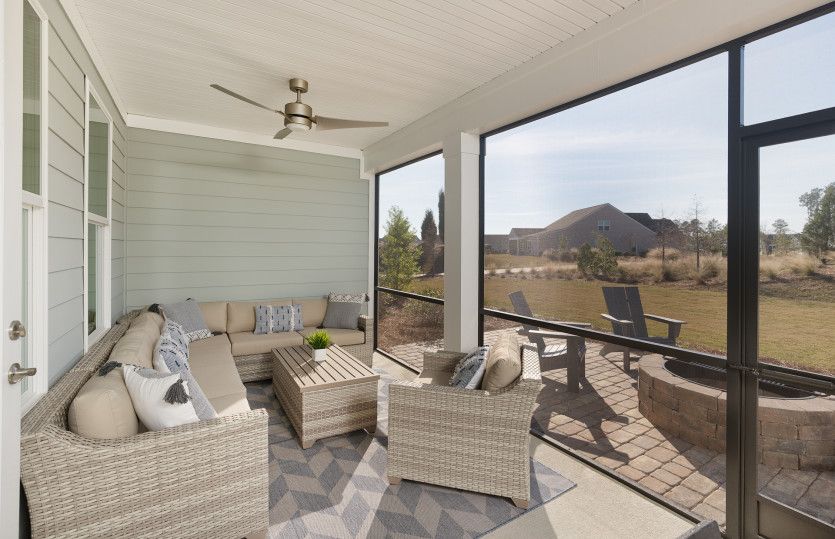 Embrace the beautiful view in the serene Sunroom on quiet evenings or entertaining.