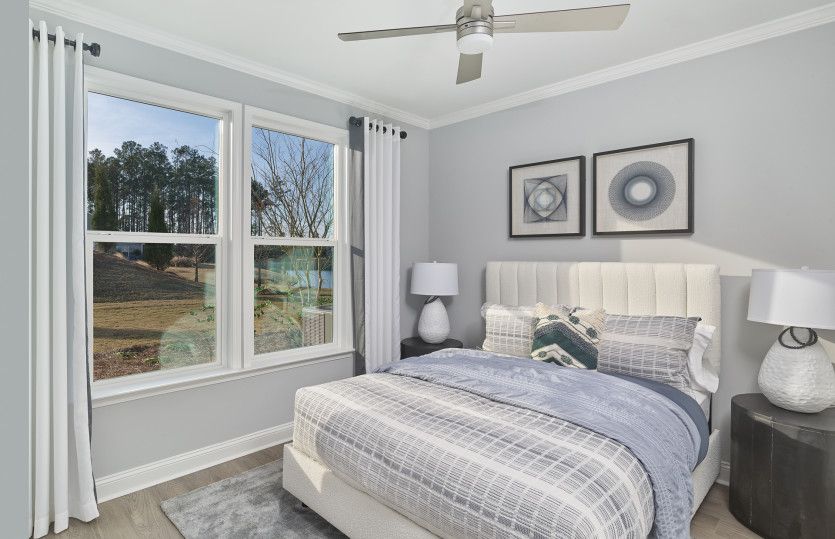 Spacious guest bedroom designed for privacy and relaxation.
