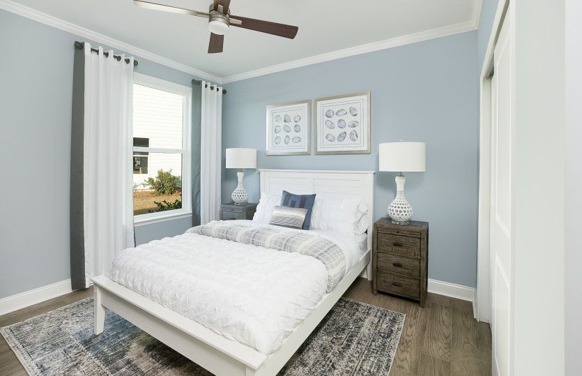 Bright and airy additional guest bedroom.