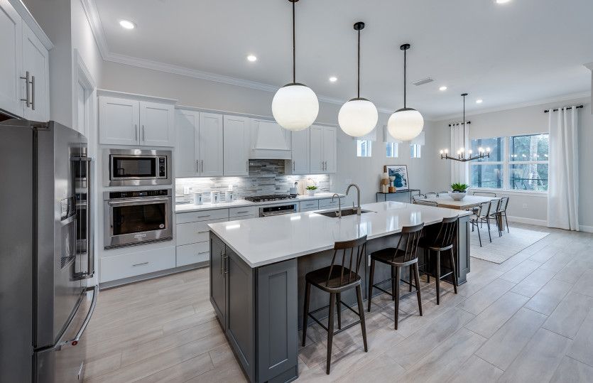 Kitchen with stainless steel appliances and large island