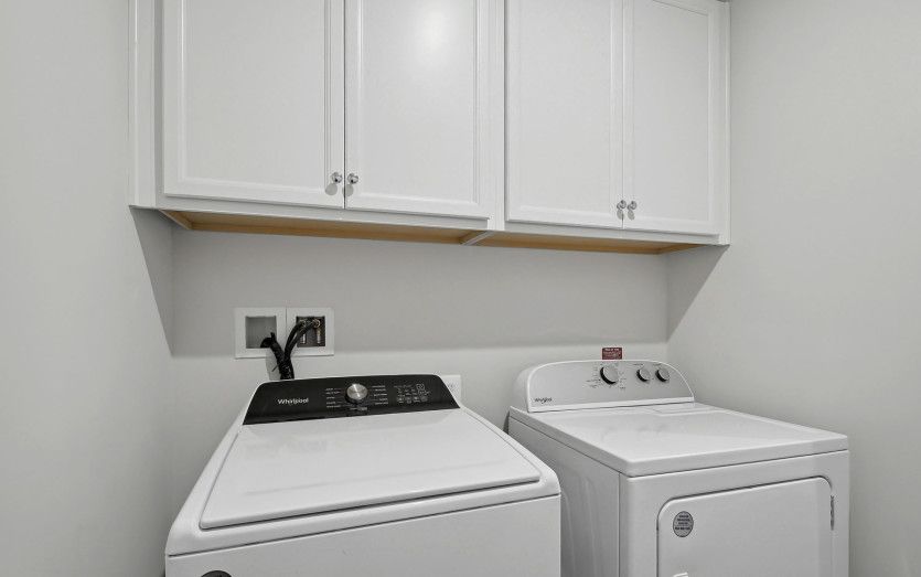 Laundry Room with Full Size Washer and Dryer
