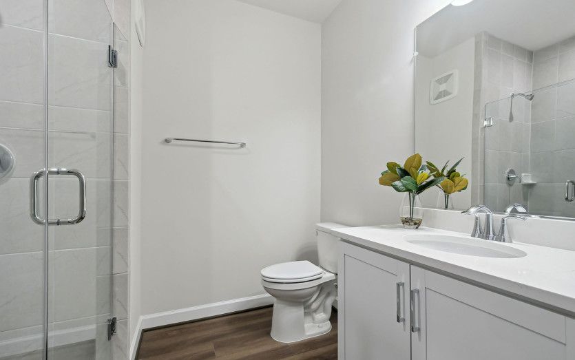 Secondary Bath with Glass Shower Enclosure