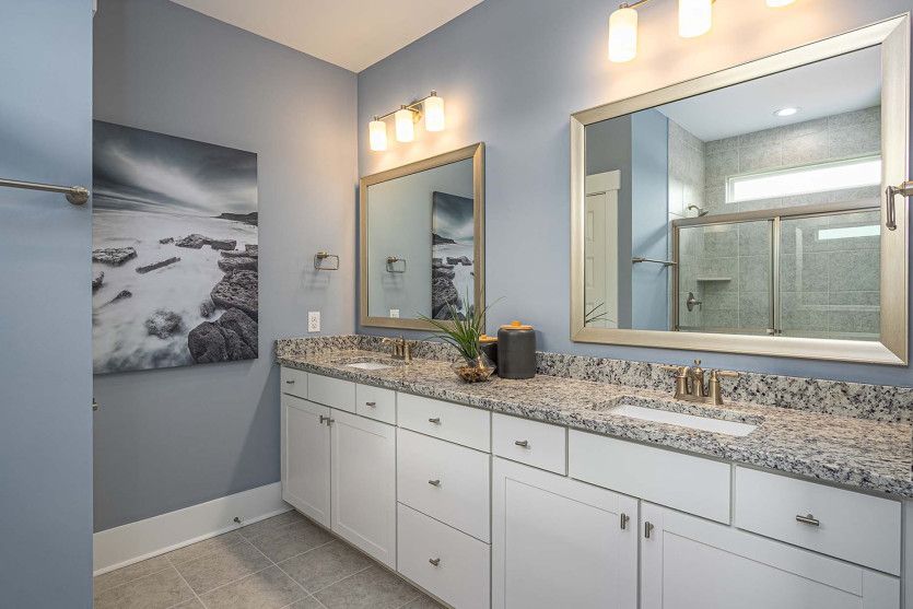Luxury Owner's Bath with dual vanity and walk-in shower