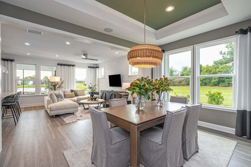 Dining open to the gathering room and kitchen