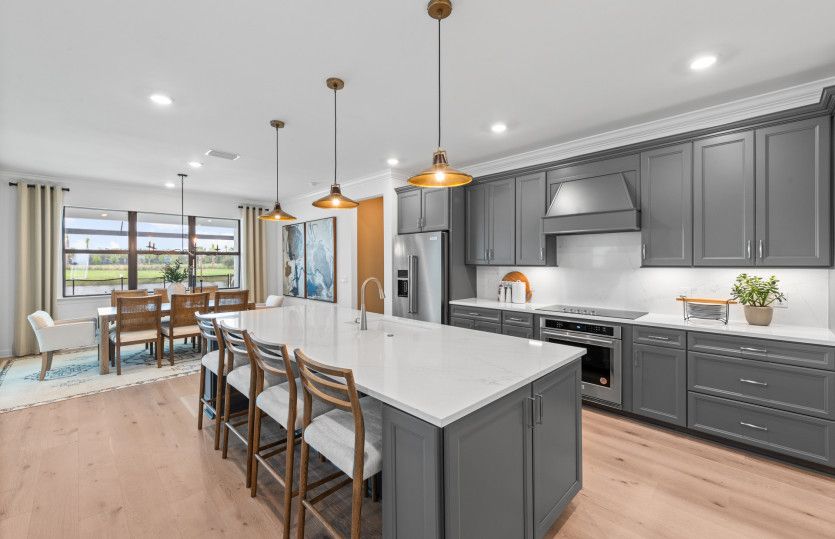 Oversized island in gourmet kitchen