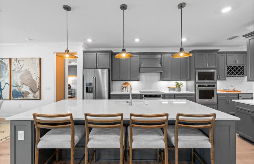 Designer kitchen featuring stainless steel appliances