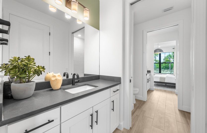 Additional view of Jack and Jill style bathroom with private sinks