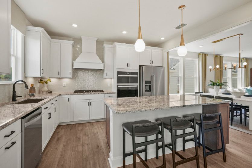 Kitchen Opens to Cafe and Gathering Room