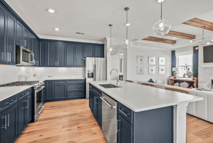 Kitchen Opens to Cafe and Gathering Room
