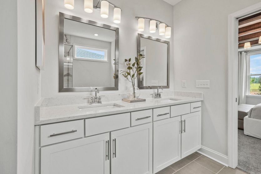 Upgraded Owner's Bath with Dual Bowl Vanity, Walk-In Shower, and Optional Tub