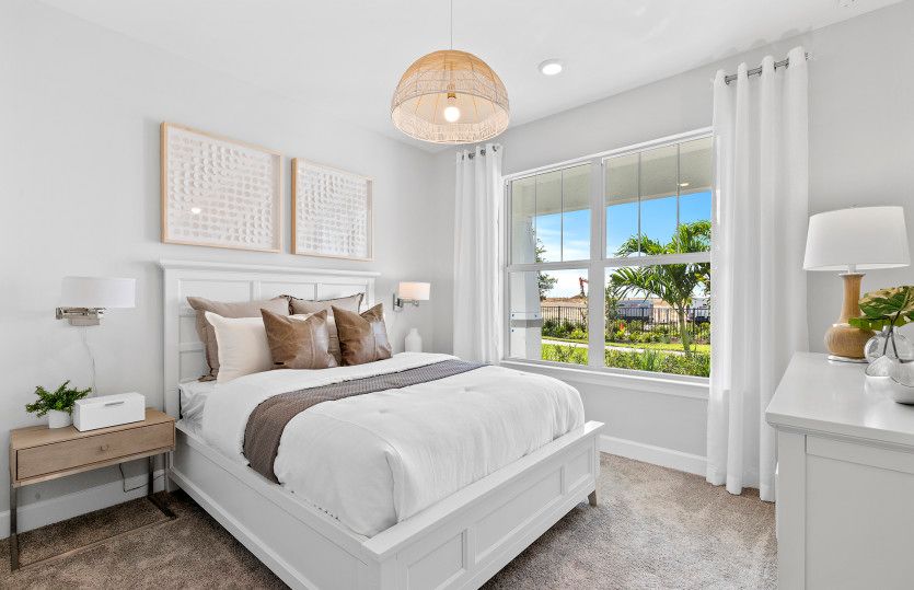 Secondary bedroom in the front of home with closet