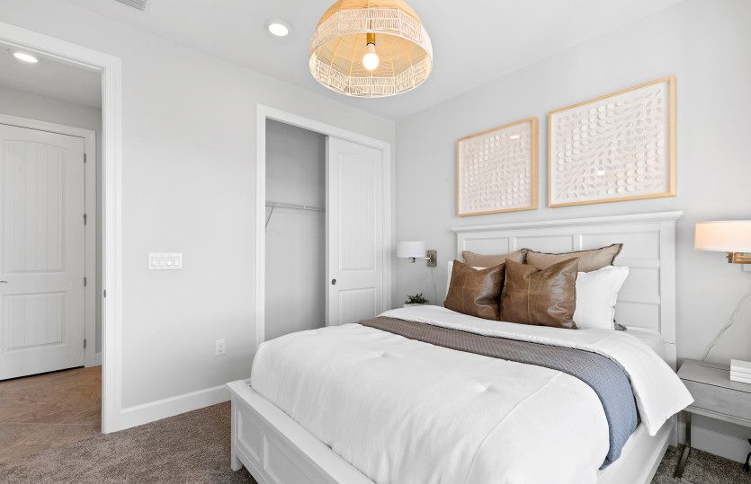 Secondary bedroom in the front of home with closet