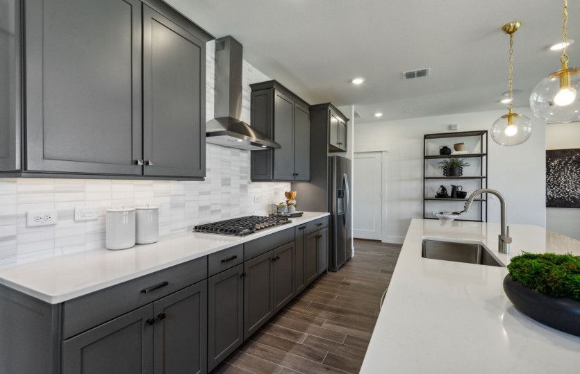 Spacious kitchen with recessed lighting*model representation