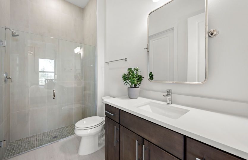 Modern bathroom finishes in vibrant active adult homes
