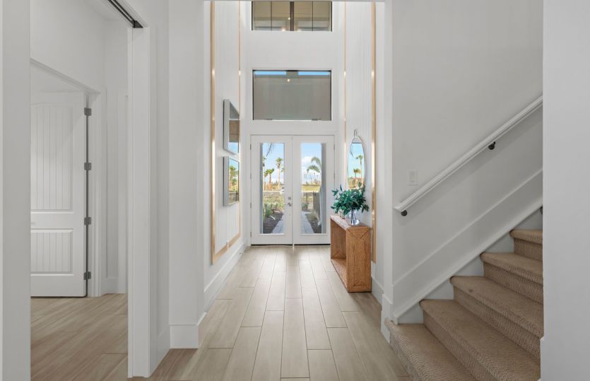 Welcoming foyer into this new construction home