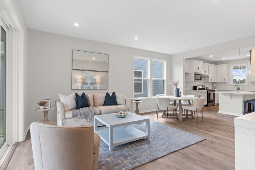 Living Area providing lots of seating for guests - Model Representation