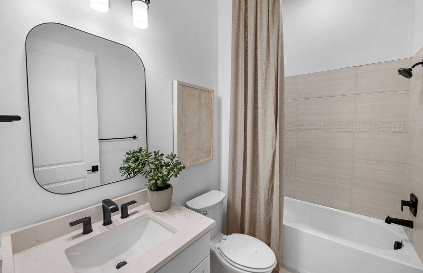Modern bathroom finishes in vibrant active adult homes