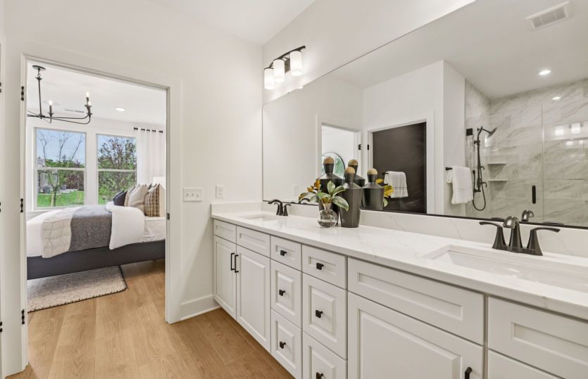 Luxurious Owner's Bath with Dual Basin Vanity