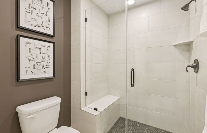 Optional Frameless Shower with Seat in the Hall Bath for Secondary Bedrooms