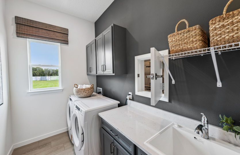 Upgraded Laundry Room with Convenient Pass-Through