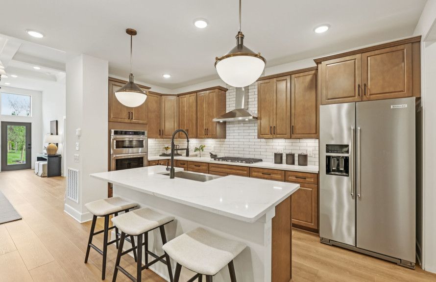 Optional Gourmet Kitchen Opens to the Café and Gathering Room