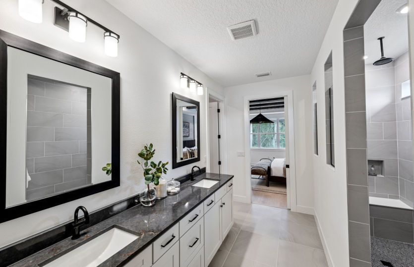 Owner's Bathroom with Dual Sinks and Walk-In Shower