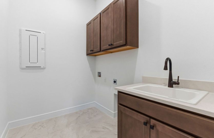 Laundry Room with Built-In Cabinets