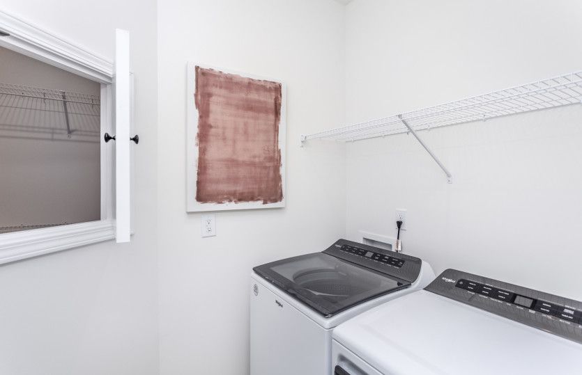 Laundry Room with Convenient Walk-In Closet Access