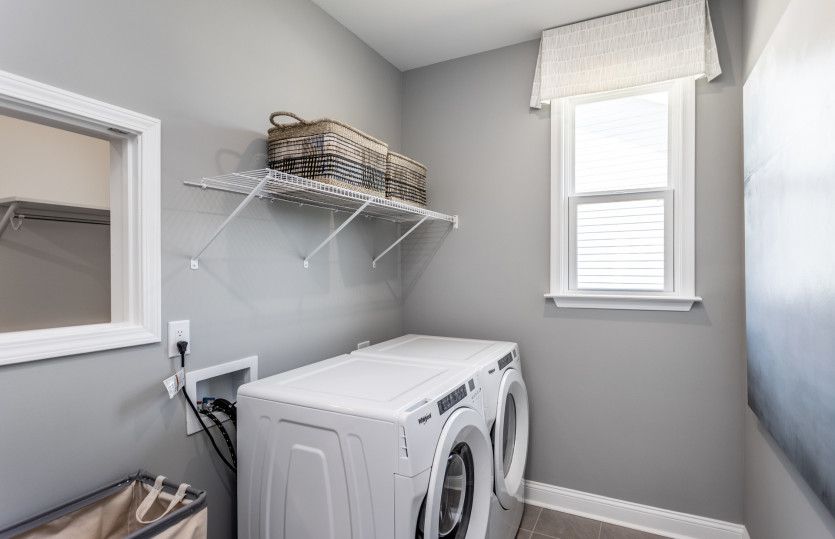 Large Laundry Room with Laundry Shoot