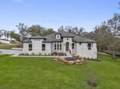 Double Eagle Ranch por Empire Homes en Austin Texas