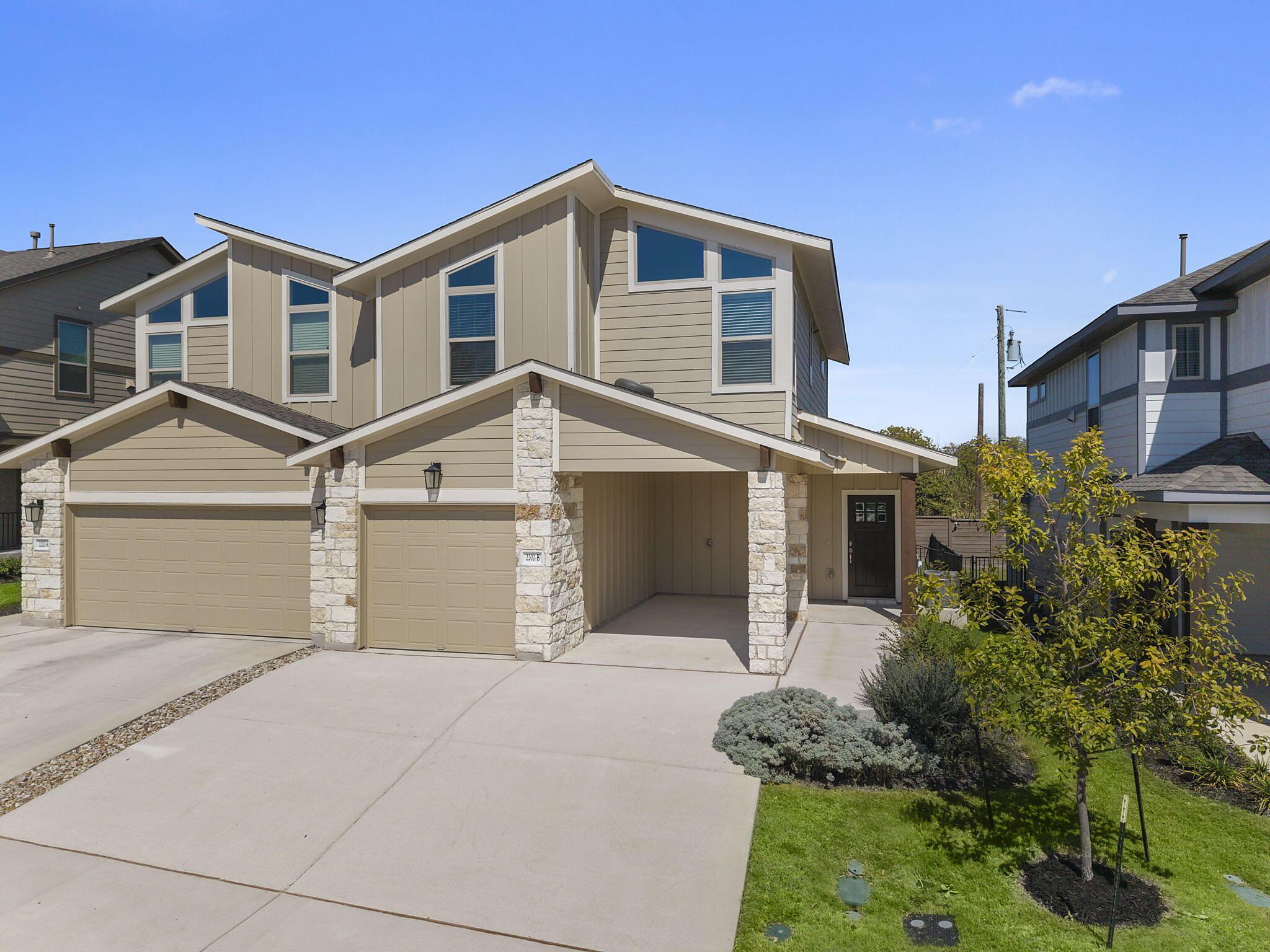 Magnolia: Carport - Villas at Rowe: Pflugerville, Texas - Empire Homes