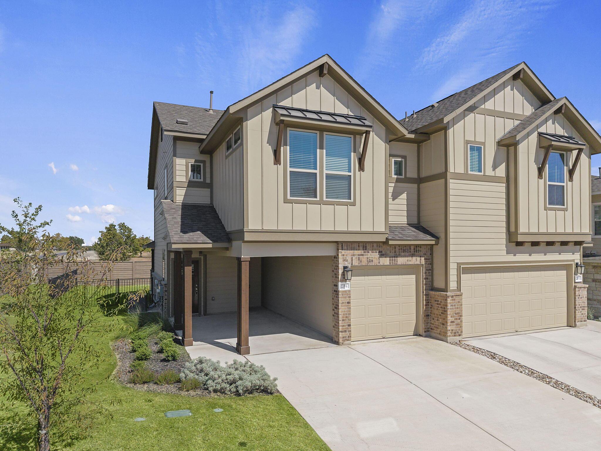 Abbey: Carport - Villas at Rowe: Pflugerville, Texas - Empire Homes