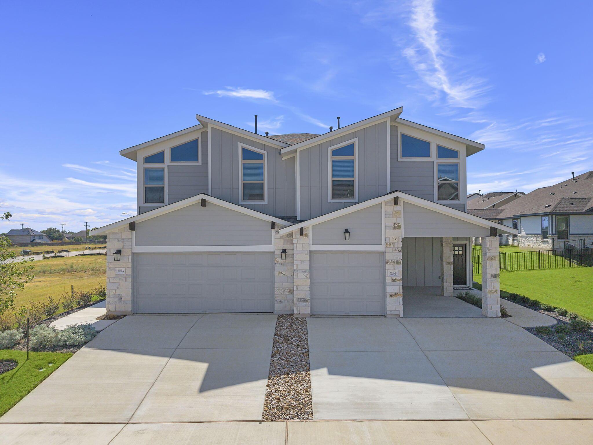 Magnolia: Garage - Villas at Rowe: Pflugerville, Texas - Empire Homes