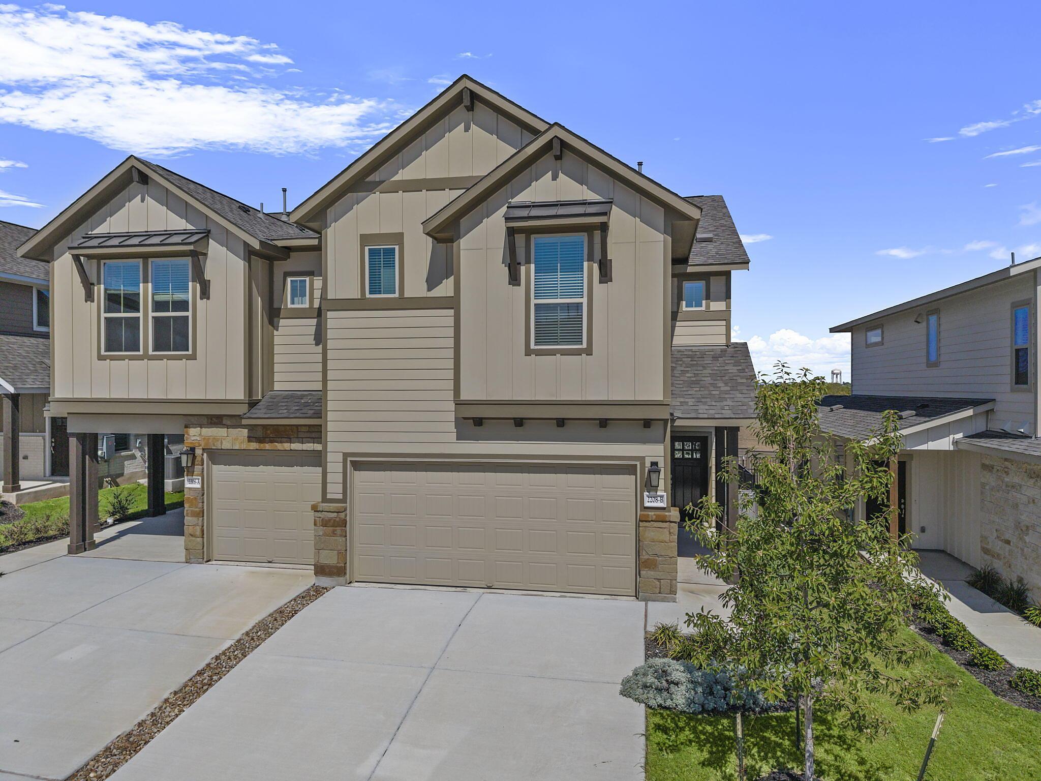 Abbey: Garage - Villas at Rowe: Pflugerville, Texas - Empire Homes
