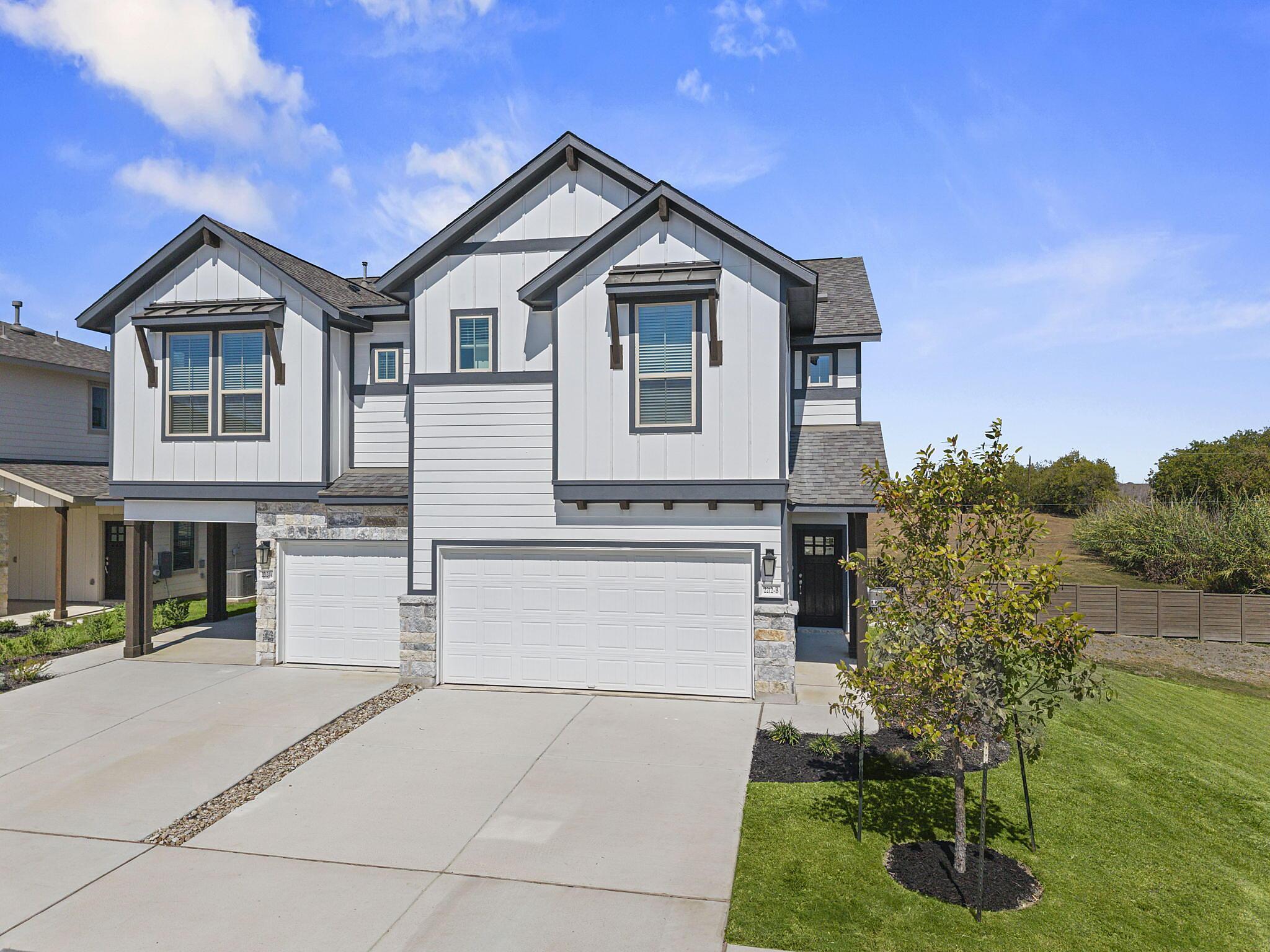 Abbey: Garage - Villas at Rowe: Pflugerville, Texas - Empire Homes