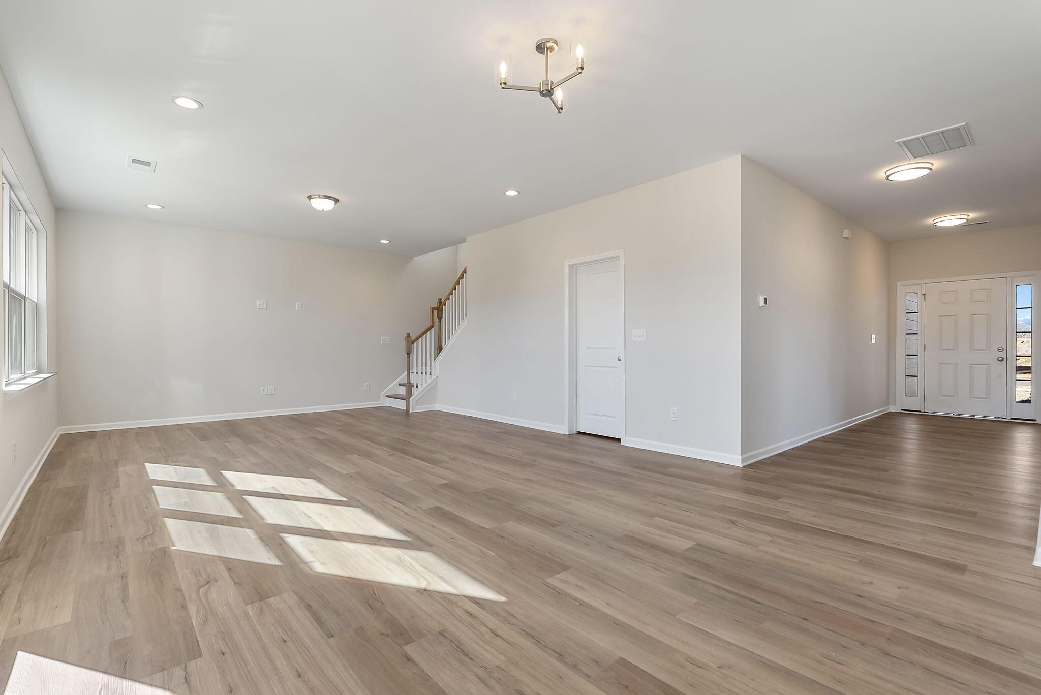 Breakfast, Family Room & Foyer