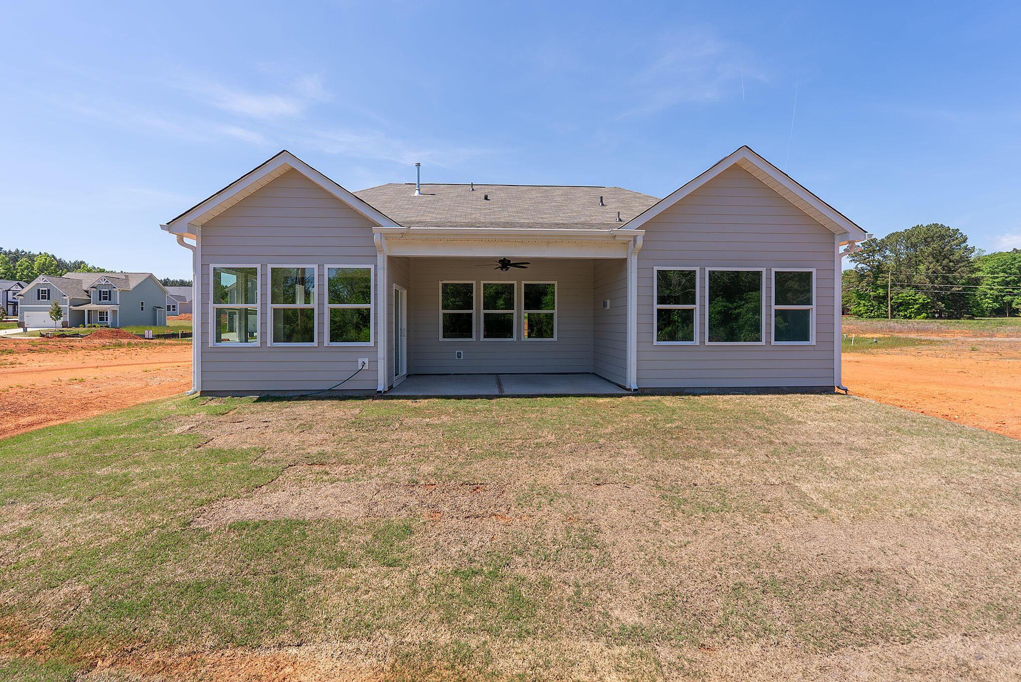 Back of Home with Covered Patio