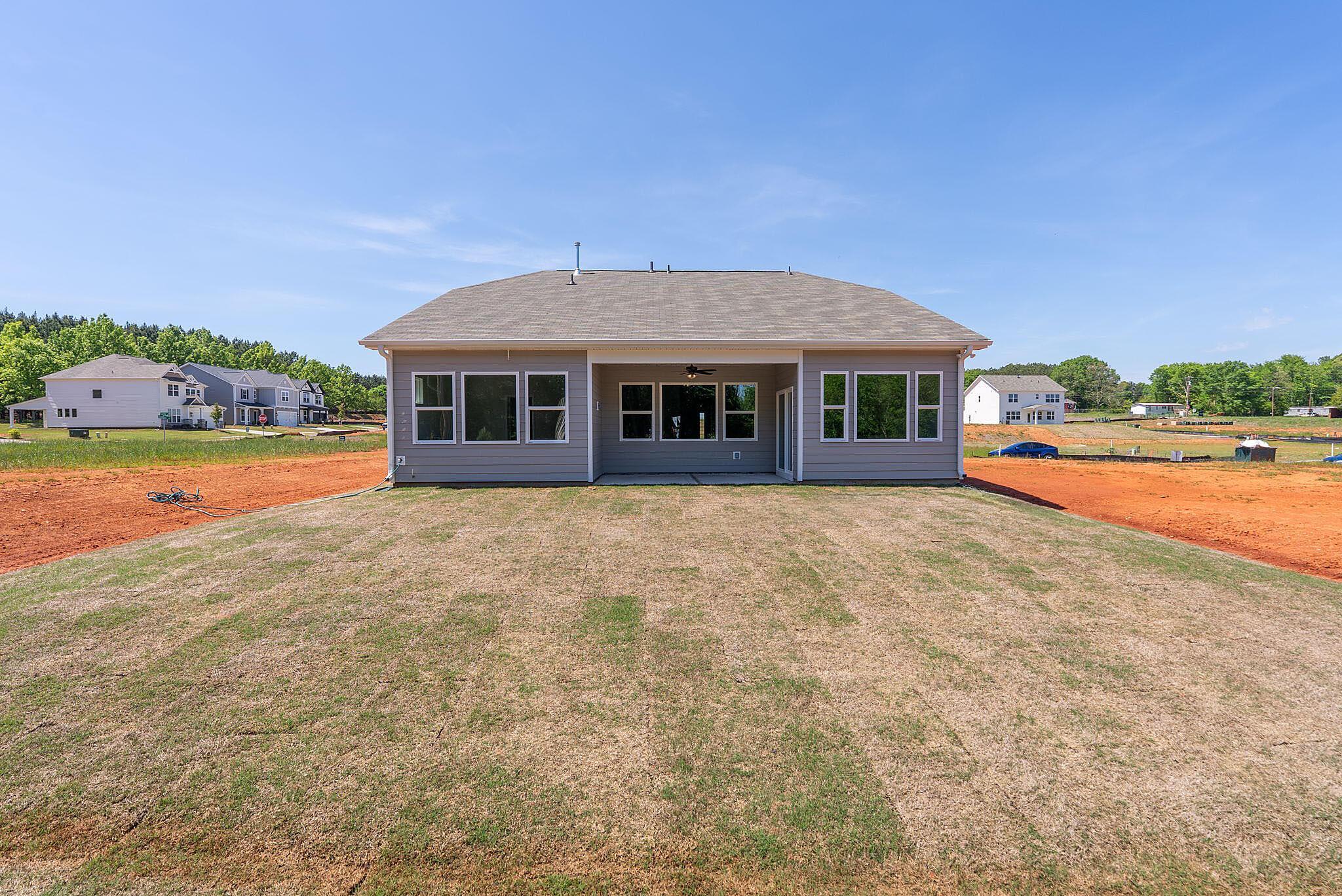 Back of Home with Covered Patio