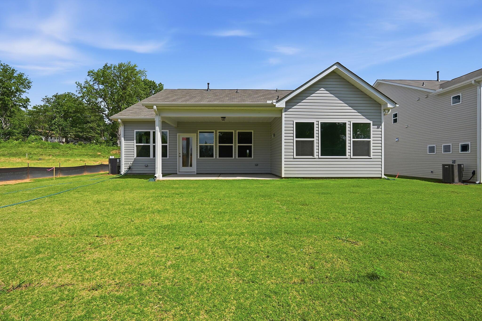 Back of Home with Covered Patio